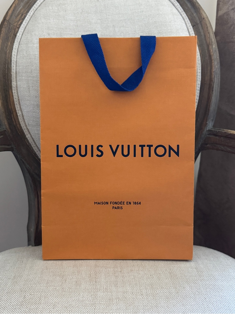 Louis Vuitton Orange Shopping Bag with Blue Ribbon Handles